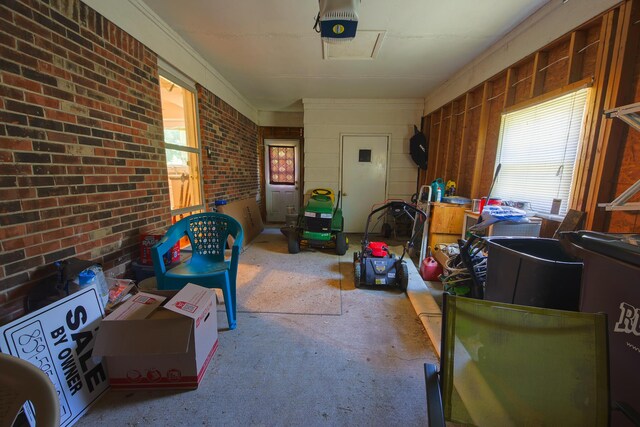 miscellaneous room featuring brick wall