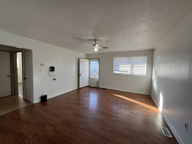 346 Becks Creek Rd, Williamsburg, KY 40769 - unfurnished room with a textured ceiling, ceiling fan, and dark hardwood / wood-style flooring