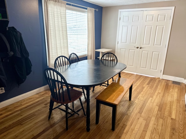 dining area featuring light hardwood / wood-style flooring