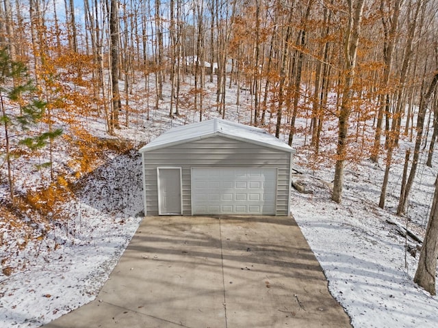 view of snow covered garage