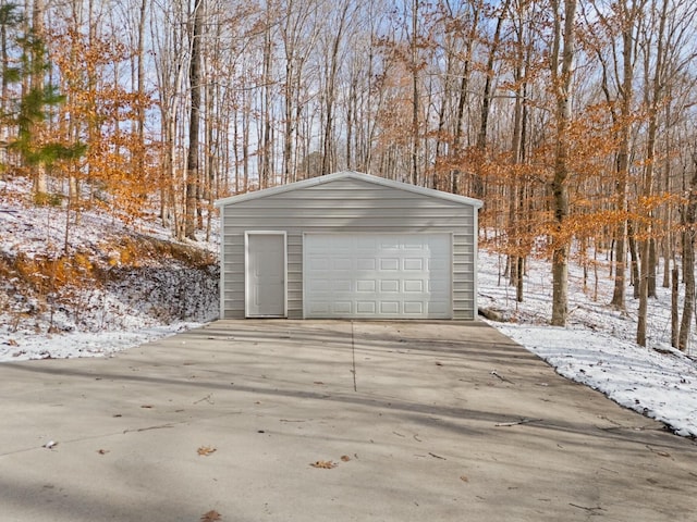 view of snow covered garage