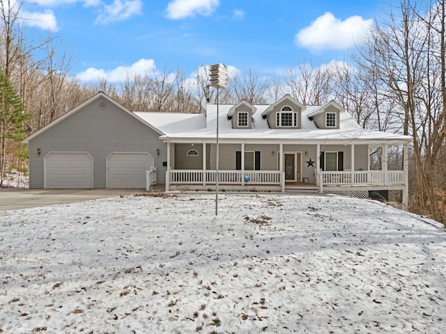 view of front facade featuring a garage and covered porch