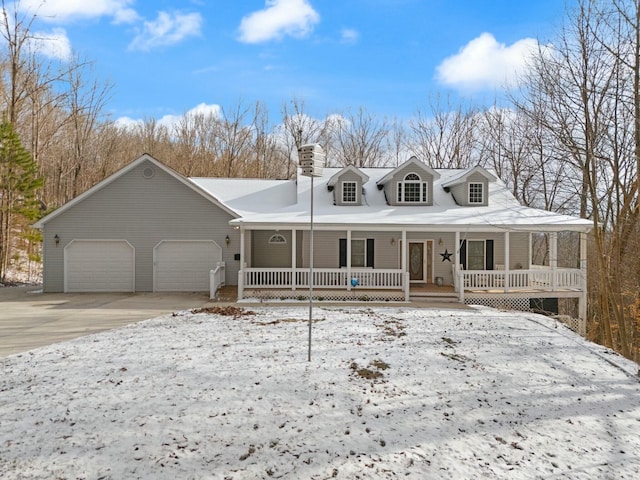 view of front of home with a garage and a porch