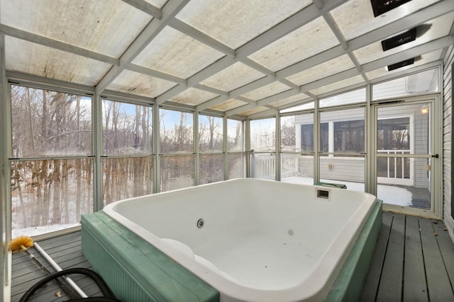 sunroom featuring a jacuzzi and coffered ceiling