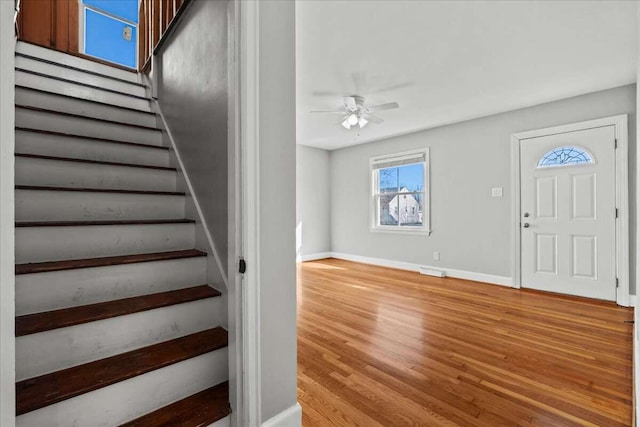 entrance foyer featuring ceiling fan and light wood-type flooring