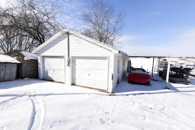 view of snow covered garage