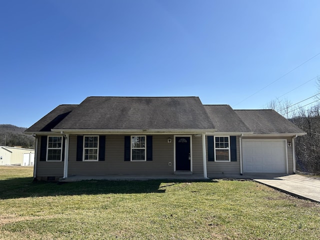 ranch-style house with a garage and a front yard