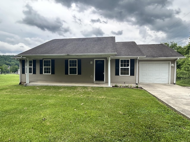 1465 Blaze Valley Rd, Somerset, KY 42501 - view of front facade featuring an attached garage, driveway, a front yard, covered porch, and roof with shingles