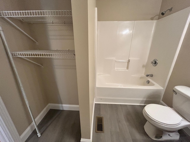 1465 Blaze Valley Rd, Somerset, KY 42501 - full bath with wood finished floors, toilet,  shower combination, and baseboards