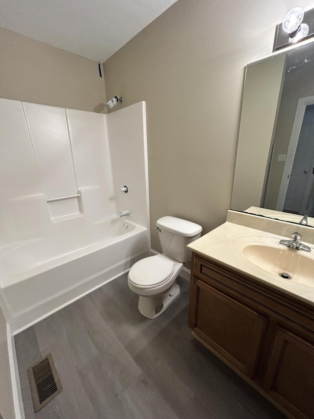 1465 Blaze Valley Rd, Somerset, KY 42501 - bathroom featuring wood finished floors, vanity, toilet, and  shower combination