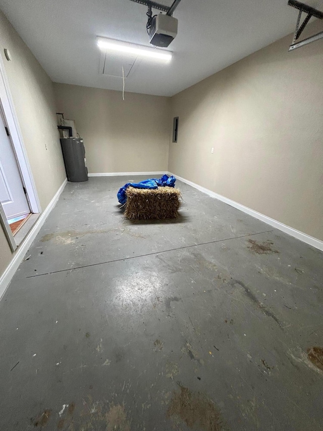 garage featuring a garage door opener and water heater