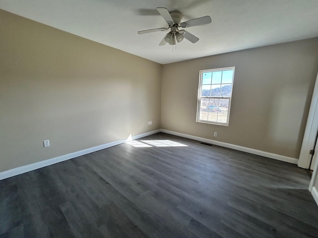 1465 Blaze Valley Rd, Somerset, KY 42501 - empty room featuring baseboards, ceiling fan, and dark wood-style flooring
