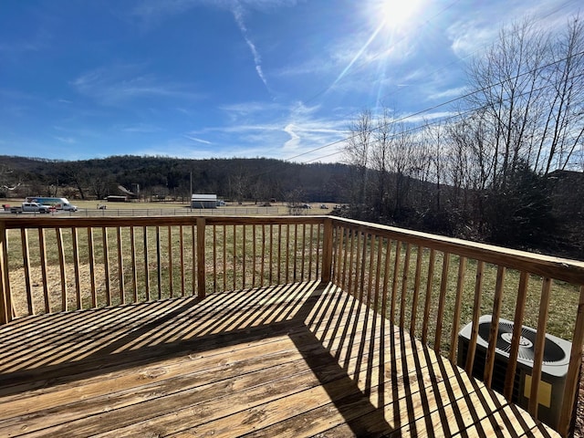 wooden deck with a yard