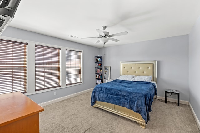 bedroom featuring ceiling fan and carpet flooring