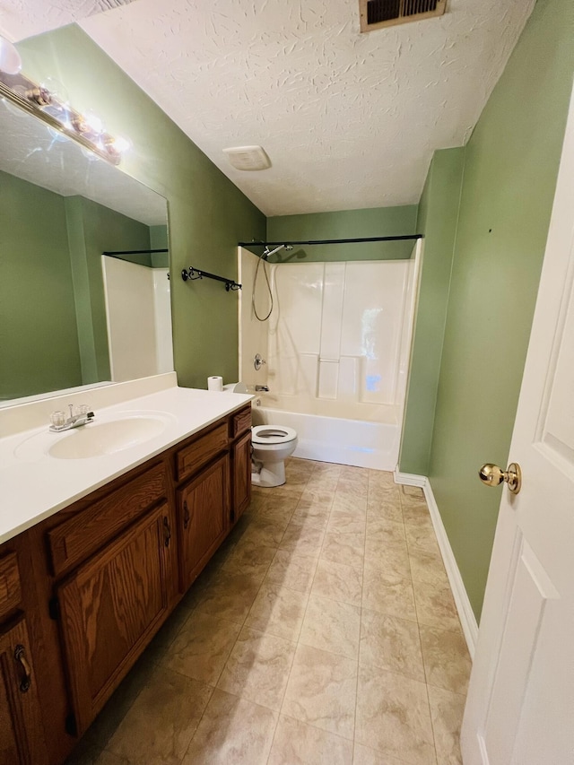 full bathroom featuring visible vents, toilet, bathtub / shower combination, a textured ceiling, and vanity