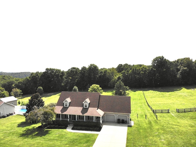 bird's eye view featuring a forest view