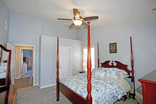 bedroom featuring ceiling fan, lofted ceiling, and carpet floors