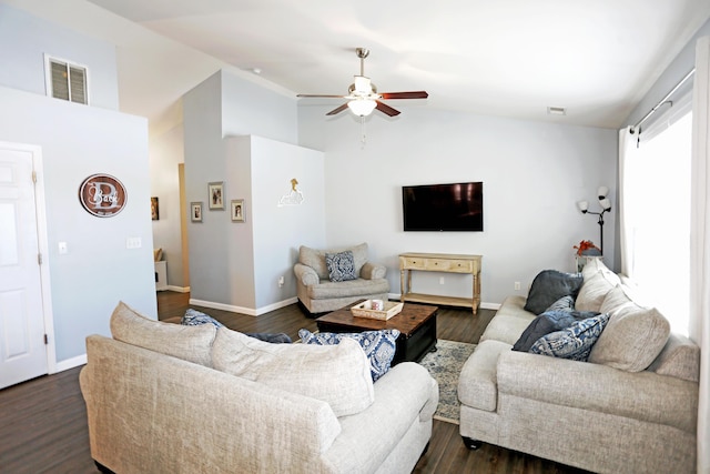 living room with dark wood-type flooring, high vaulted ceiling, and ceiling fan