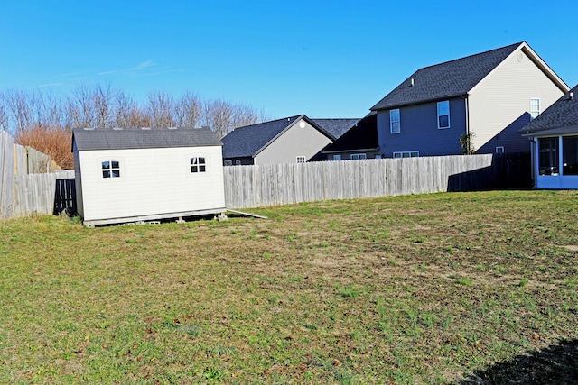 view of yard with a storage shed