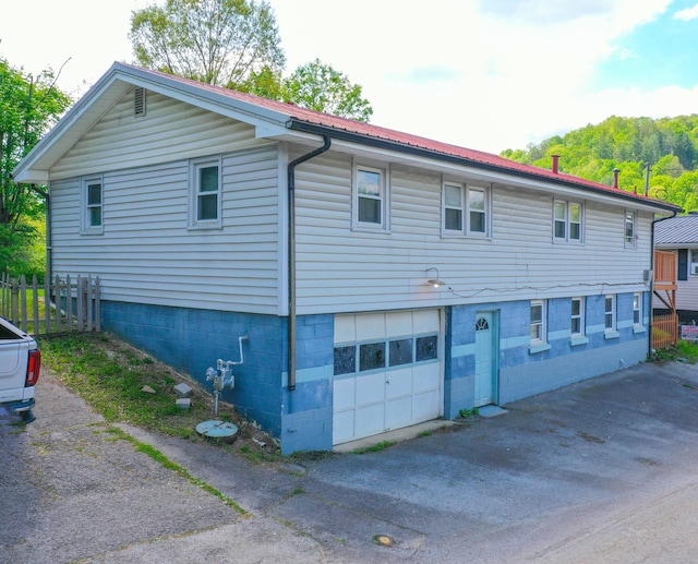 view of front of home with a garage