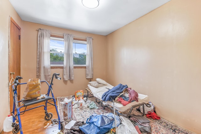 bedroom featuring wood-type flooring