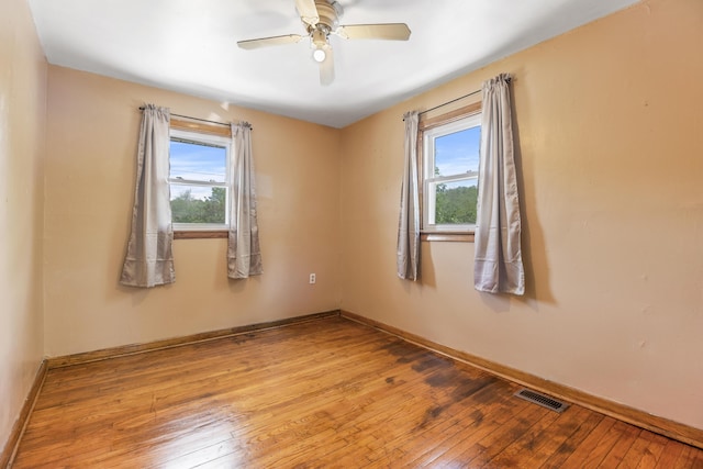 unfurnished room featuring ceiling fan and light hardwood / wood-style floors