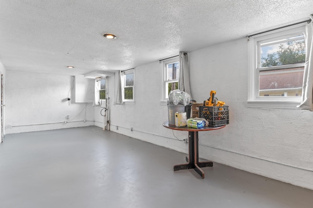 basement with a textured ceiling