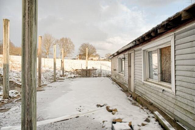 view of snow covered property