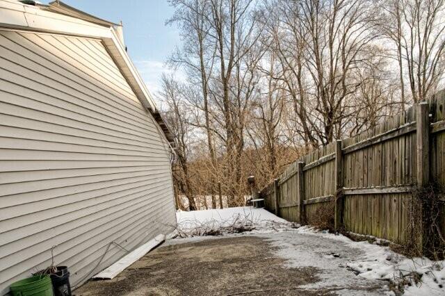 view of yard covered in snow