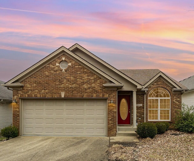 view of front of property with a garage