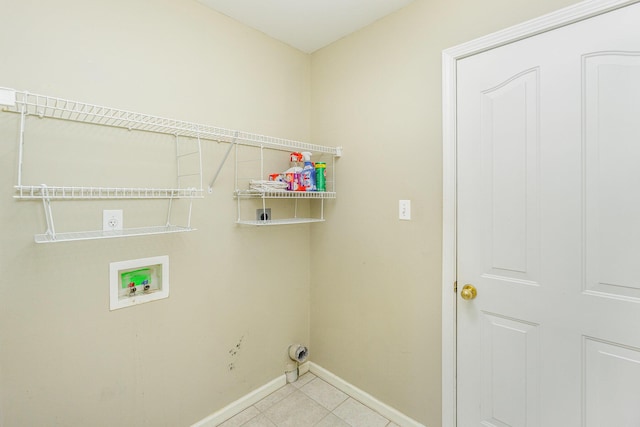 washroom with light tile patterned flooring, hookup for an electric dryer, and hookup for a washing machine