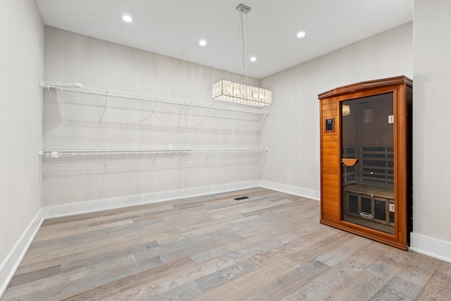 unfurnished dining area with light wood-type flooring