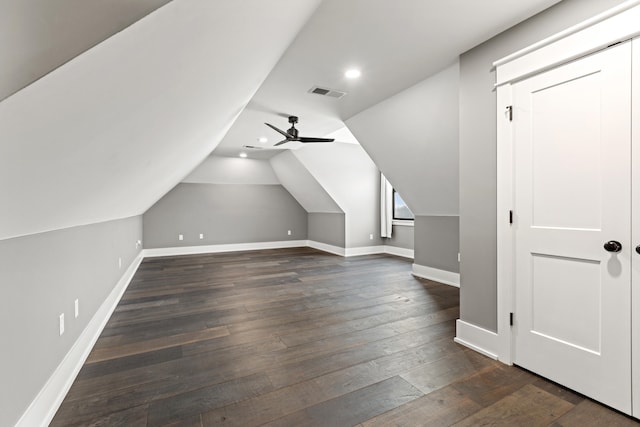 additional living space with vaulted ceiling, ceiling fan, and dark hardwood / wood-style flooring