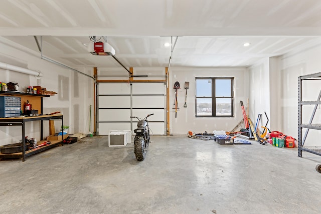 garage featuring a garage door opener