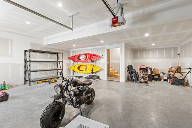 garage featuring a garage door opener