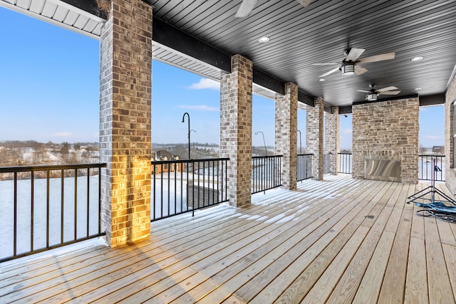 snow covered deck with ceiling fan