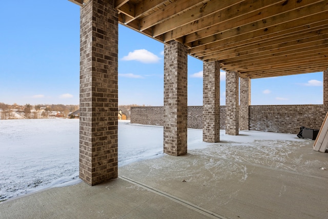 view of snow covered patio