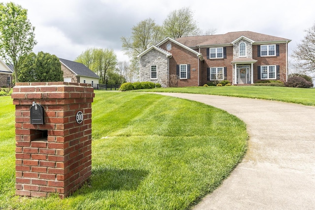 view of front facade with a front yard