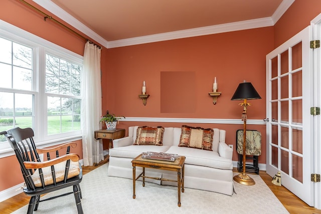 interior space featuring ornamental molding and hardwood / wood-style floors