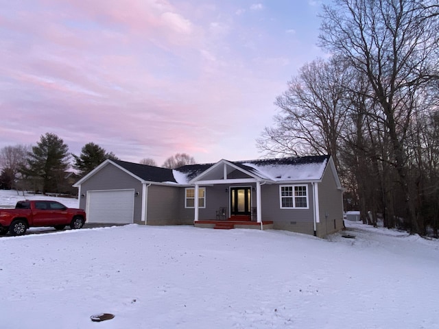 single story home featuring a garage