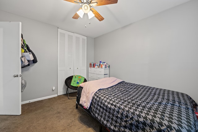 carpeted bedroom featuring a closet and ceiling fan