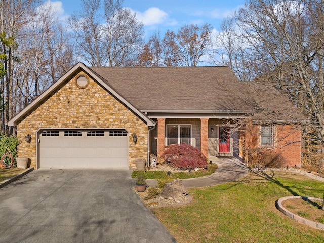 single story home featuring a front yard and a garage