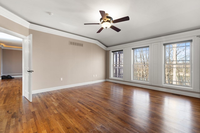 spare room featuring ceiling fan, dark hardwood / wood-style flooring, and ornamental molding