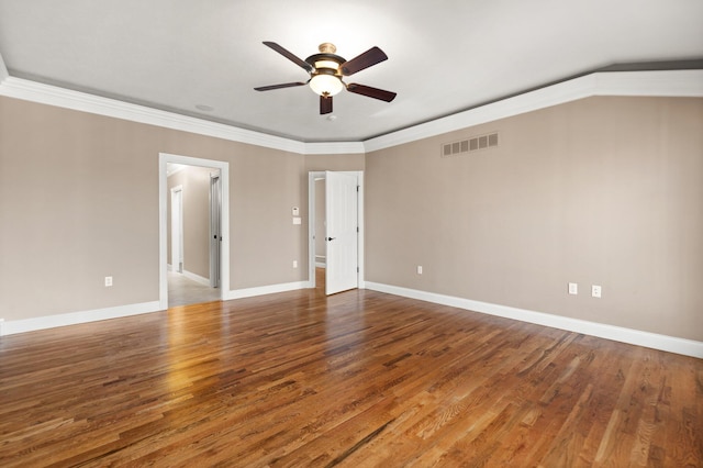 spare room with wood-type flooring, ceiling fan, and ornamental molding