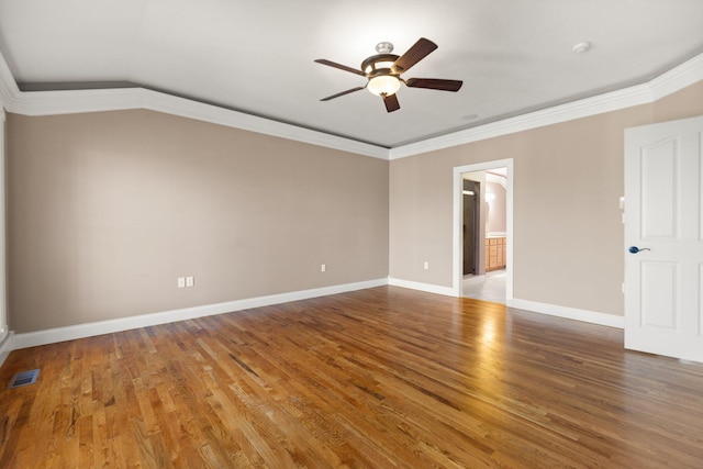 unfurnished room with crown molding, hardwood / wood-style flooring, and ceiling fan