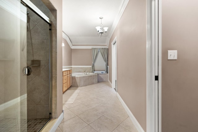 bathroom with a chandelier, independent shower and bath, and tile patterned flooring