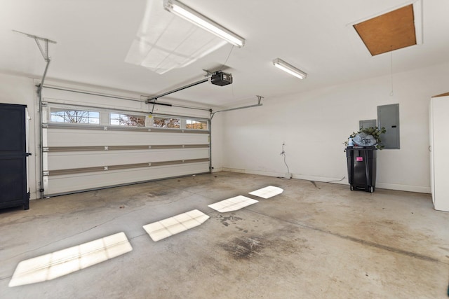 garage featuring electric panel and a garage door opener