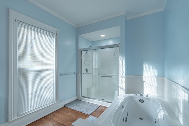 bathroom featuring independent shower and bath, ornamental molding, and wood-type flooring