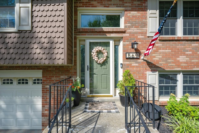 property entrance with a garage