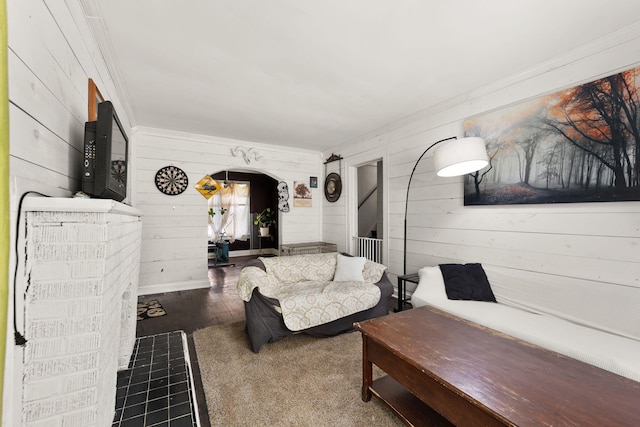 living room with wood walls